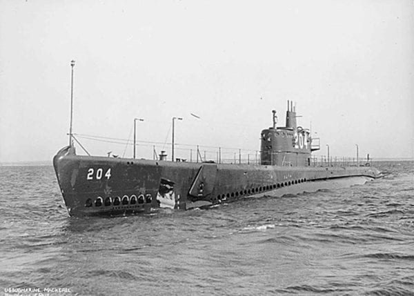 Submarine in water, a vessel where Navy personnel may have been exposed to asbestos